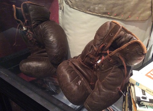 Two left handed leather boxing gloves